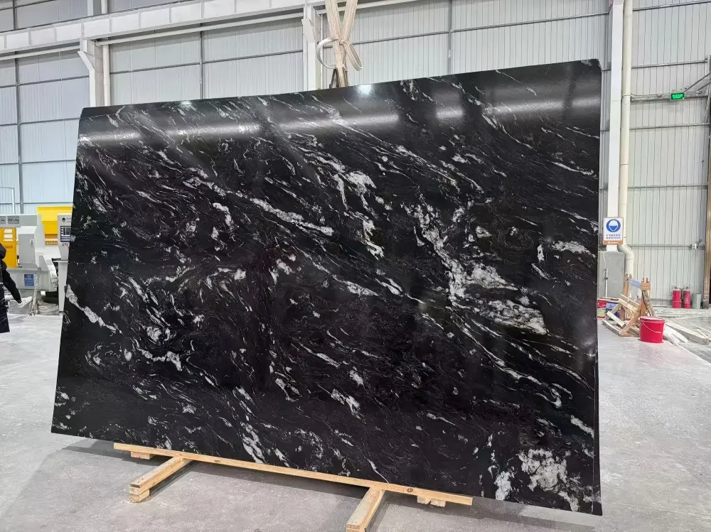 Black Titanium Granite Full Slab Black Titanium Granite full slab displayed in a stone workshop