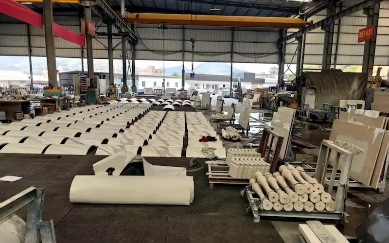 Stone processing workshop with natural stone pieces prepared for custom fabrication and export project orders
