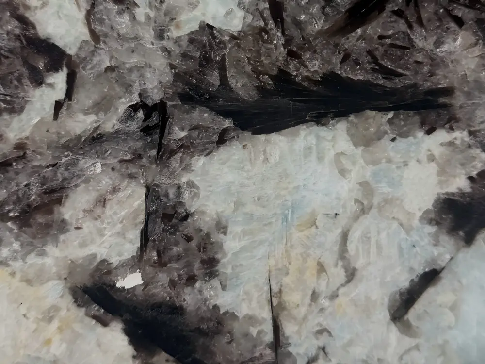 White Patagonia Quartzite crystal detail with white grey and black mineral areas